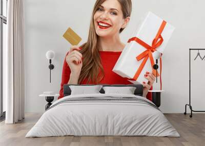 woman isolated portrait with gift and credit bank card. Wall mural