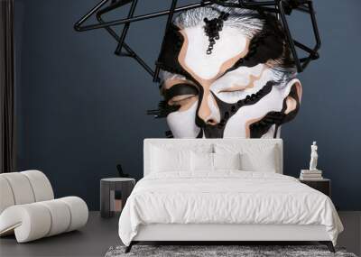 Female model with creative abstract makeup in futuristic hat Wall mural