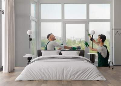 Two window installers Wall mural