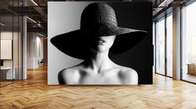 Fashion woman in hat. Contrast black and white. Wall mural