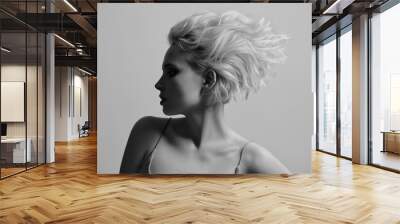 Portrait of a beautiful blonde girl with a short haircut. Black and white image. Wall mural