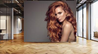 Portrait of woman with long curly beautiful ginger hair. Wall mural