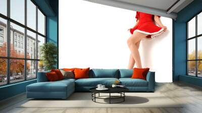 stylish woman in red xmas sexy costume isolated over white backg Wall mural