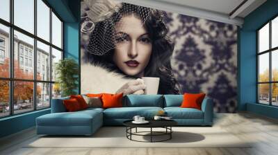 young beautiful retro lady drinking coffee Wall mural