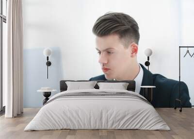 close up. young businessman working on laptop Wall mural