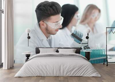 close up.male scientist conducting research in the laboratory Wall mural