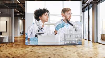 group of scientists discussing the results of their research. Wall mural