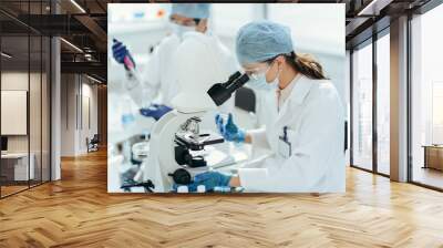 laboratory technician conducts testing in the laboratory . Wall mural