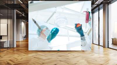 modern scientists and doctors work in a medical laboratory. Wall mural