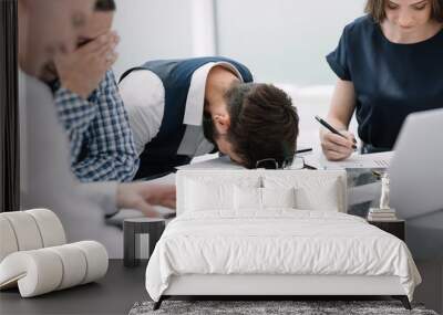 tired employee at a business meeting in the office Wall mural