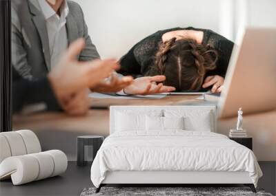 tired young businesswoman fell asleep during a group meeting Wall mural