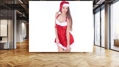 young woman model in a Christmas costume posing for the camera Wall mural