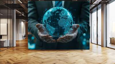 Businessman holding global data network. Wall mural