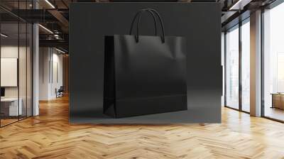 A sleek and sophisticated black paper shopping bag, featuring a glossy finish and sturdy black handles, serves as a stylish mockup. Wall mural