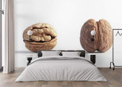 A whole walnut and a cracked walnut isolated against a white background. Wall mural