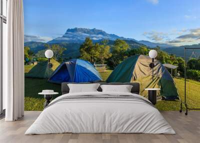 Camping point at morning with mount Kinabalu at far background. Wall mural