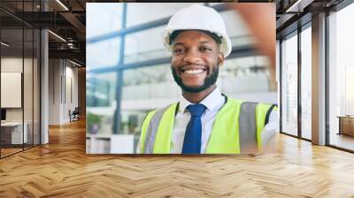 Black man, construction or engineer selfie with a smile working in office for project management. Face of a male person working in building or engineering industry with pride for career and vision Wall mural