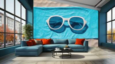 blue beach towel beach towels set with sunglasses Wall mural