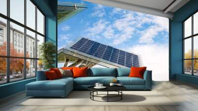 Solar panels on the background of the sky in sunny weather. Eco-friendly technology Wall mural