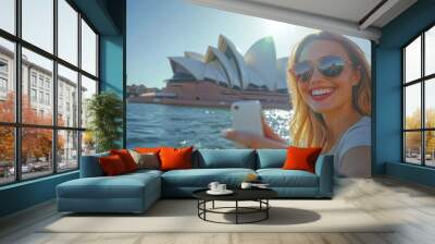 Woman Taking Selfie with Iconic Sydney Opera House and Harbour Bridge in Background on a Sunny Day Wall mural