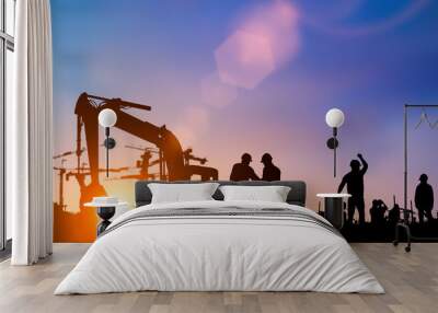 silhouette of engineer and construction team working at site over blurred background for industry ba Wall mural