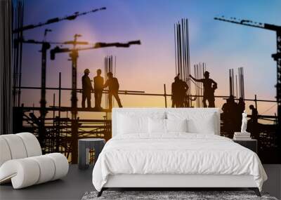 Silhouette of engineer and construction team working at site over blurred background for industry background with Light fair.Create from multiple reference images together Wall mural