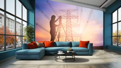 silhouette survey engineer working  over Blurred high voltage tr Wall mural