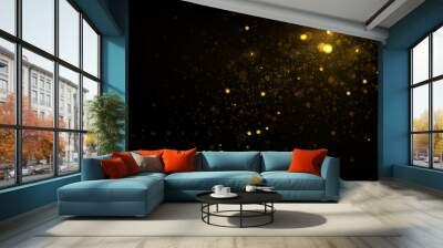 Glowing golden particles on black background Wall mural