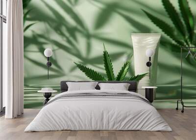 cosmetic cream tube mockup with cannabis leaf on background Wall mural