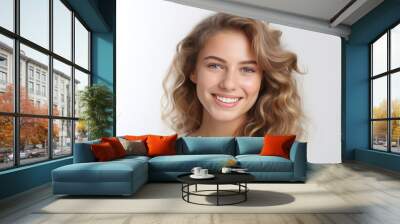 portrait of young happy woman looks at camera on white background Wall mural