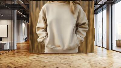 Woman in a beige sweatshirt mockup Wall mural