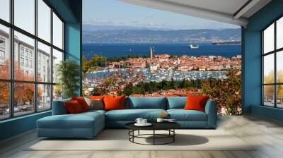 Slovenian beautiful old town and a marina of Izola can be seen in the foreground. Trieste in Italy can be seen in the back ground. Wall mural