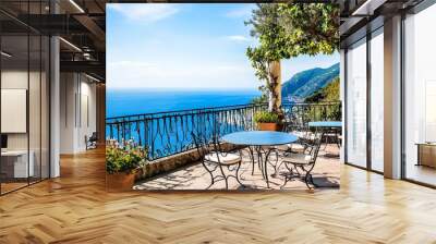 A beautiful view of the ocean with a balcony overlooking it Wall mural