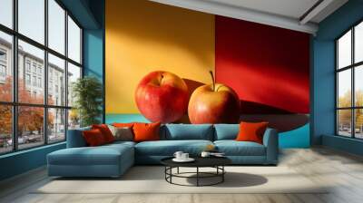 pop art still life; two apple on a colored background with deep shadows and sunbeams Wall mural