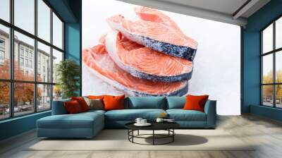 Fresh raw salmon fillet on  ice Wall mural