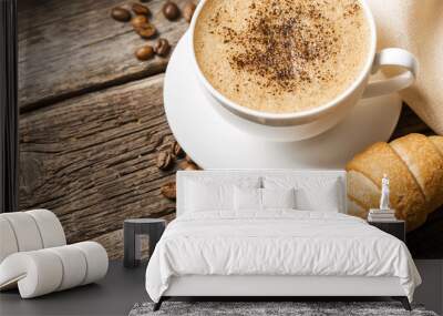 Close-up of coffee cup with roasted coffee beans on wooden backg Wall mural