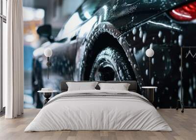 Black car wash in a modern creative studio with soft lighting. Wall mural