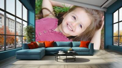 portrait of little girl outdoors in summer Wall mural