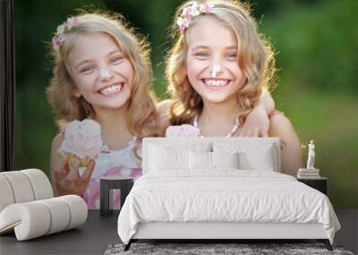 Portrait of two little girls twins Wall mural