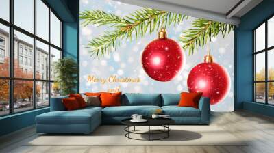 Christmas tree branch with two red toys, snowflakes and text. Christmas and New Year concept Wall mural