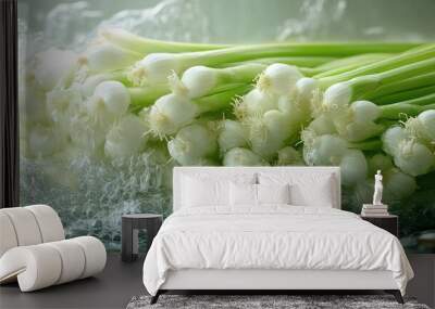 A dynamic image of fresh green floating spring onions  Wall mural