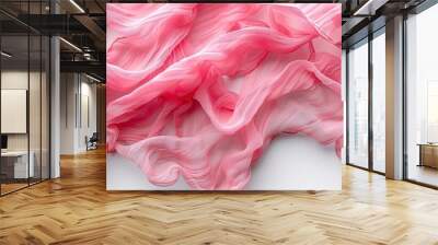 Close-up of torn pink fabric on white background Wall mural