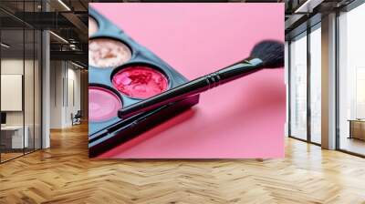 Brush and makeup palette on a background of pink Wall mural