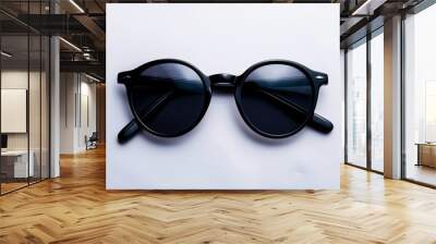 Isolated on a white background, black sunglasses Wall mural