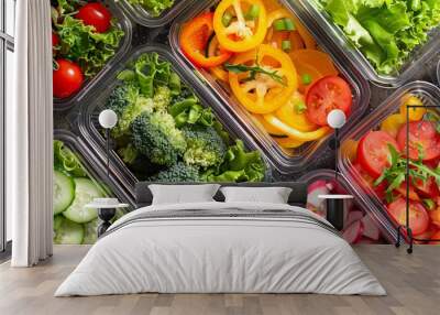 Top view of a close-up of several healthy vegetable salad lunch boxes packaged in plastic. Diet Take away food  Wall mural