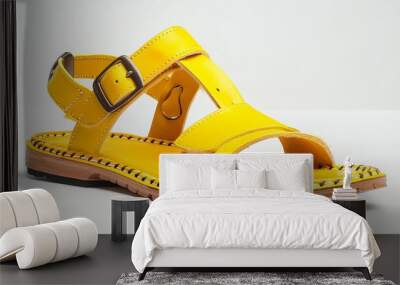 Yellow leather sandals in a casual style with a white backdrop and text and logo copy space Wall mural