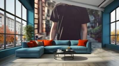 Teenage Model Mockup – Top Boy wearing a black t-shirt while strolling down a street during the day, hipster adult shirts mockup template for design print,  Wall mural