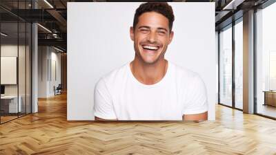 A professional portrait studio photo of a handsome young white american man model with perfect clean teeth laughing and smiling. isolated on white background Wall mural