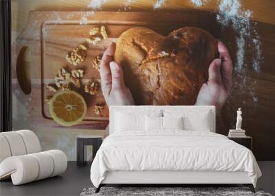 close up of grandma's hands cooking homemade cake in the kitchen top view Wall mural