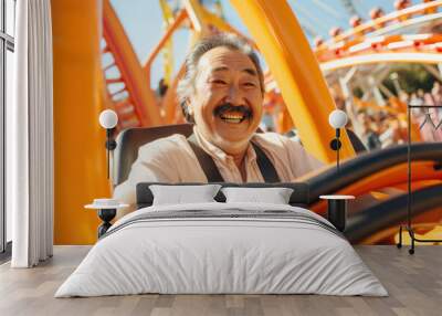 A cheerful elderly chinese asian man with a white beard rides a roller coaster Wall mural